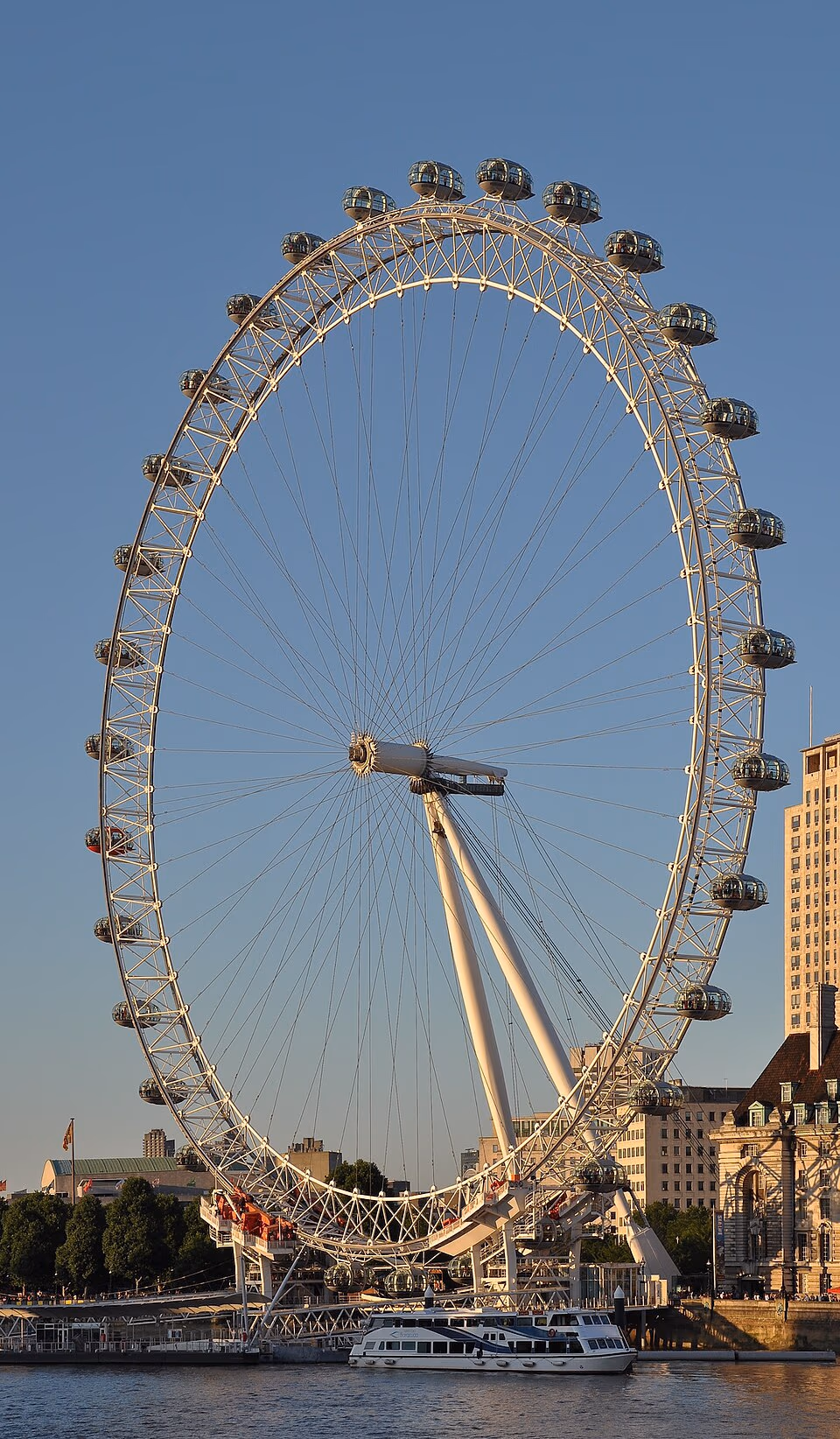 The London Eye beside the River Thames in evening light